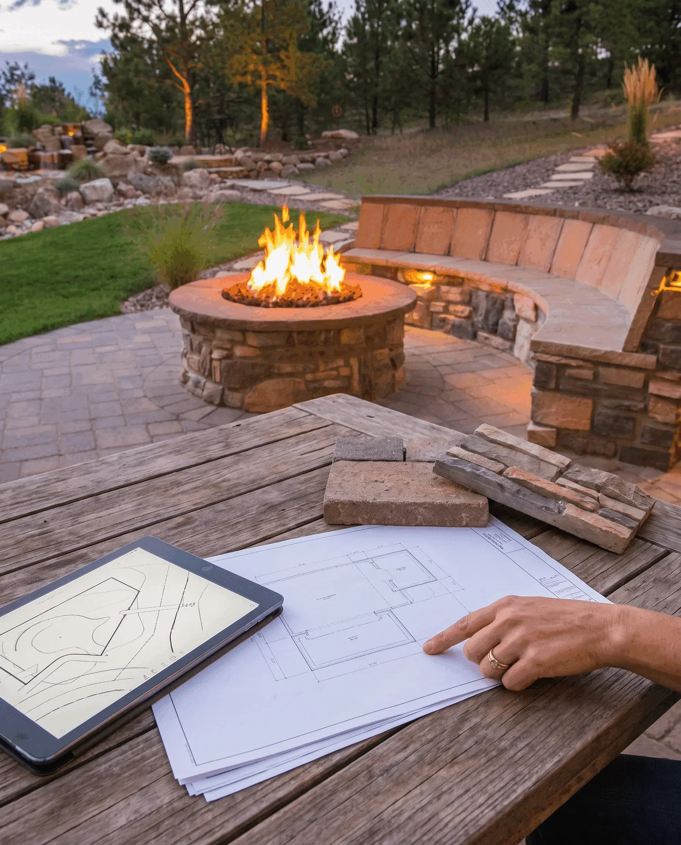 Fire-feature materials and planning views arranged for a project review