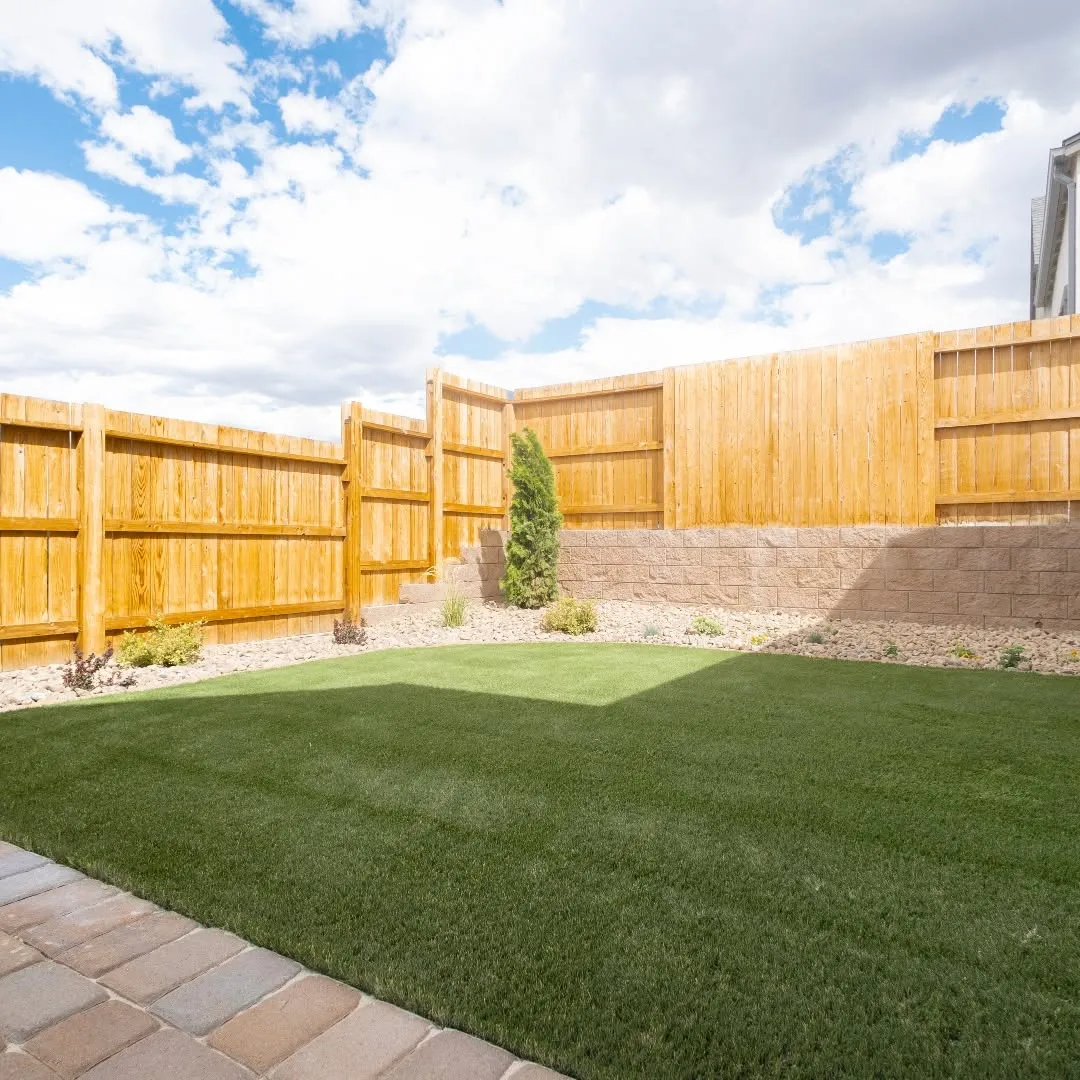 Artificial turf integrated with a residential walkway