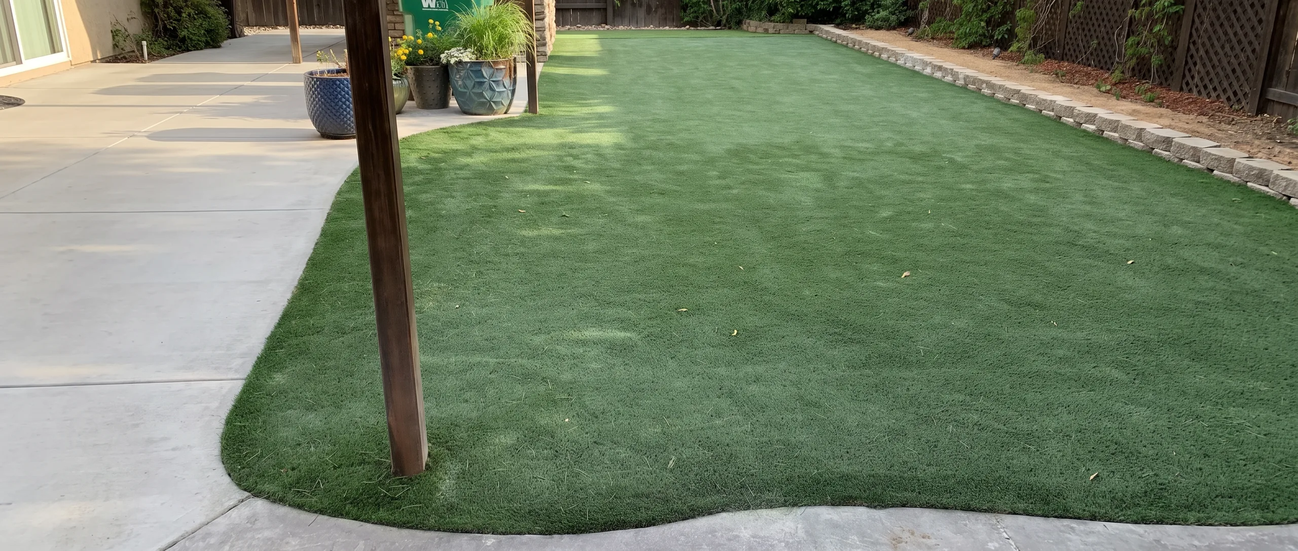 Residential putting-green surface shaped within the available backyard